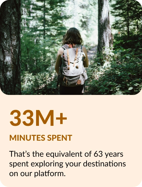 Woman walking through forest
